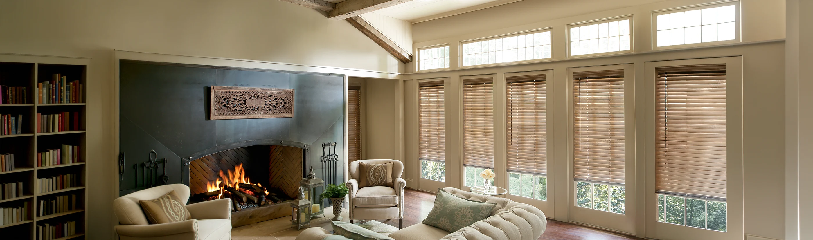 Woman in front of blinds