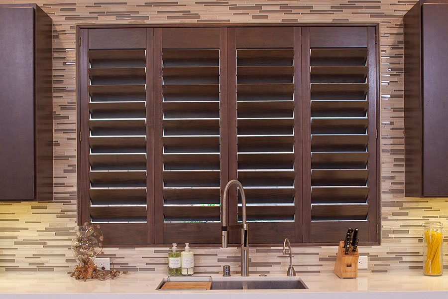 Ovation shutters above a modern kitchen sink