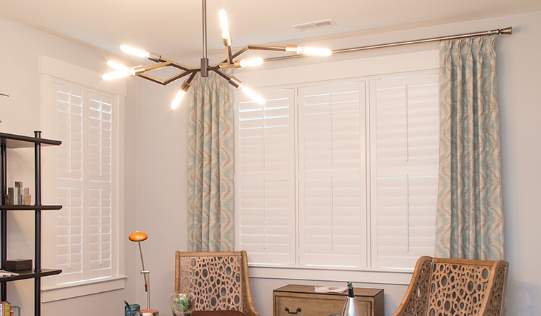 White Polywood shutters within an office