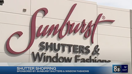 video snapshot of a sunburst logo on the sunburst building