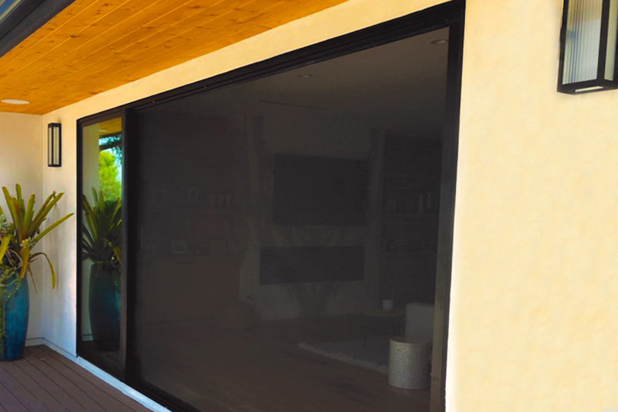 Large and wide black retractable screen with black trim